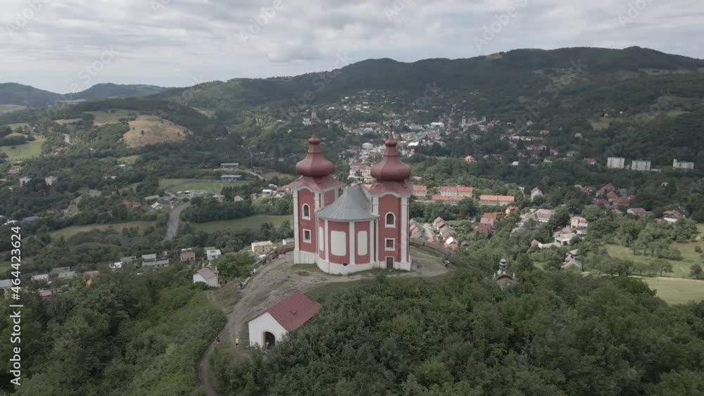 Chapel with view on the small city in the middle of mountains. Chapel with view on the small city in the middle of mountains.