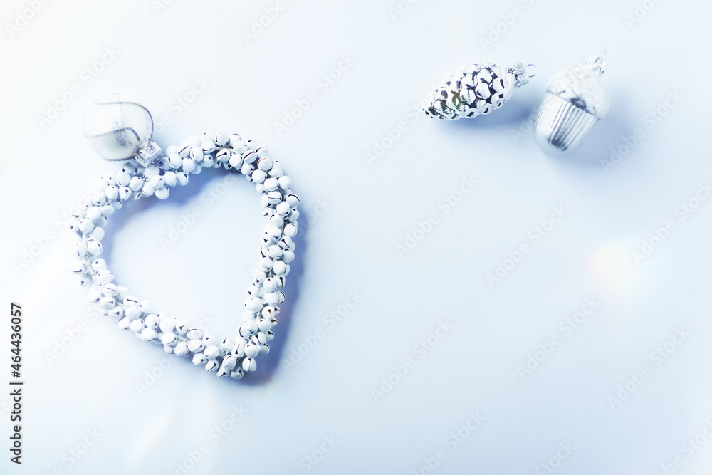 Christmas ornaments on bright paper background. Top view. Close up. Copy space. Christmas ornaments on bright paper background. Top view. Close up. Copy space.