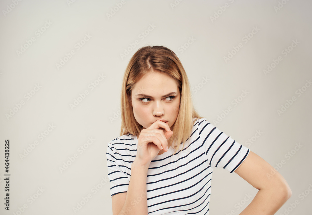 blonde woman in a striped T-shirt advertising Lifestyle Studio blonde woman in a striped T-shirt advertising Lifestyle Studio