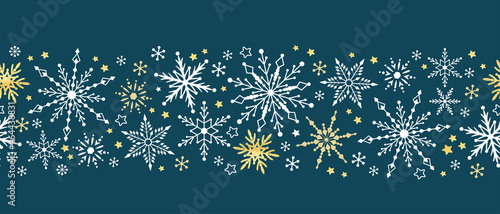 Winter pattern seamless background with snowflakes. Silver gold and neavy christmas motif