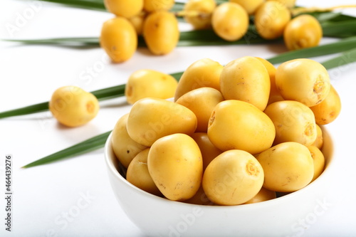 Bowl of fresh harvested ripe sweet date fruits. healthy vegan diet food.