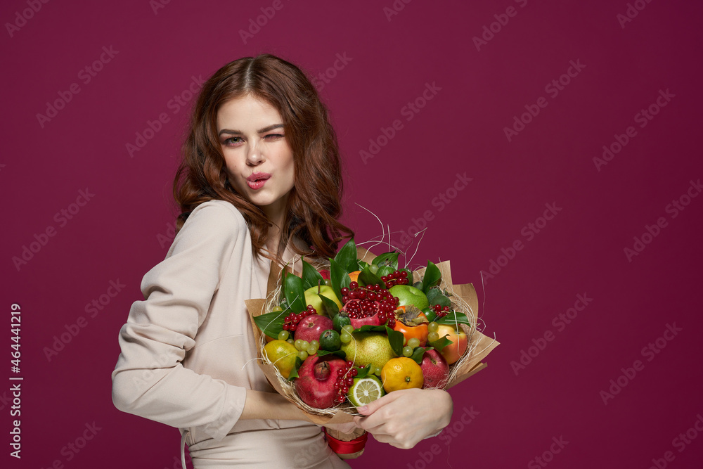beautiful woman bright makeup attractive look a bouquet of fruits pink background beautiful woman bright makeup attractive look a bouquet of fruits pink background