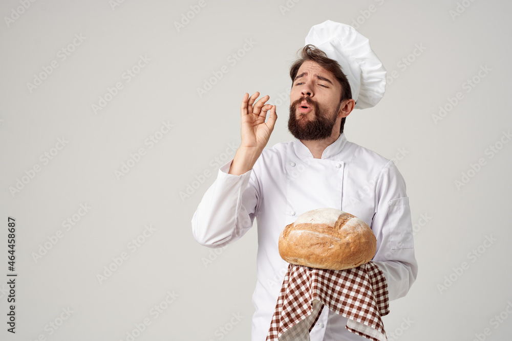 Baker with bread in hand culinary industry Baker with bread in hand culinary industry