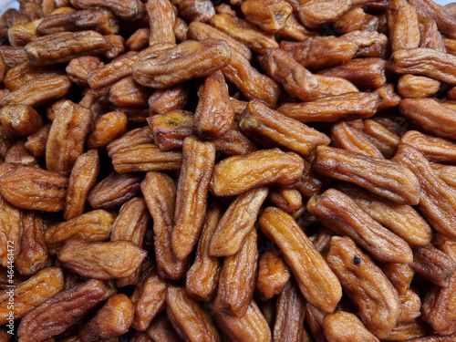 Sugar coated bananas, a popular food preservation method in Thailand, are a snack.