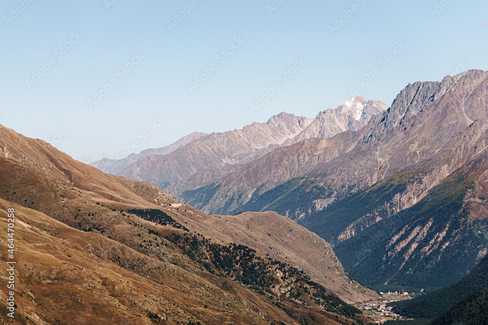 High mountains of Russia. The beauty of the North Caucasus. High quality photo. Clear blue sky at sunset
