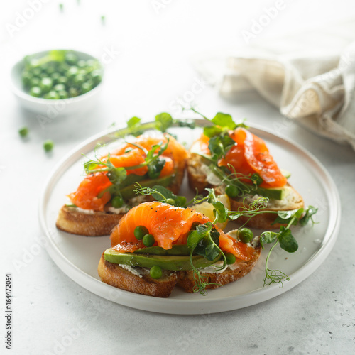 Homemade salmon bruschetta with green pea