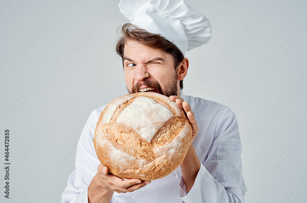 bearded man chef with bread in hand Professional emotions bearded man chef with bread in hand Professional emotions