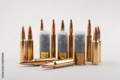 Diffrent type of rifle bullets isolated on grey background.