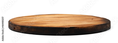 Foto Dark wooden cutting board on white background