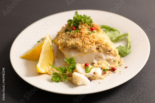 fish fillet with crumbs and lemon