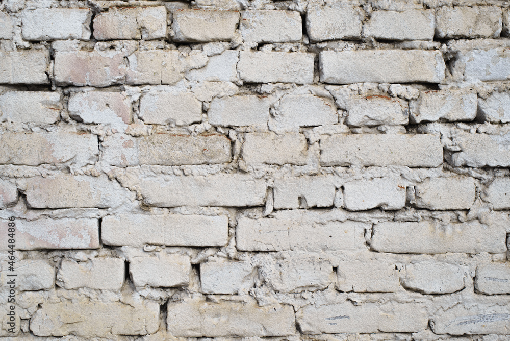 White brick old wall, horizontal brickwork outdoors. Texture background White brick old wall, horizontal brickwork outdoors. Texture background