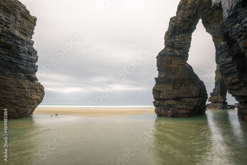 Ponds left by the tide under the famous arches of As Catedrais beach