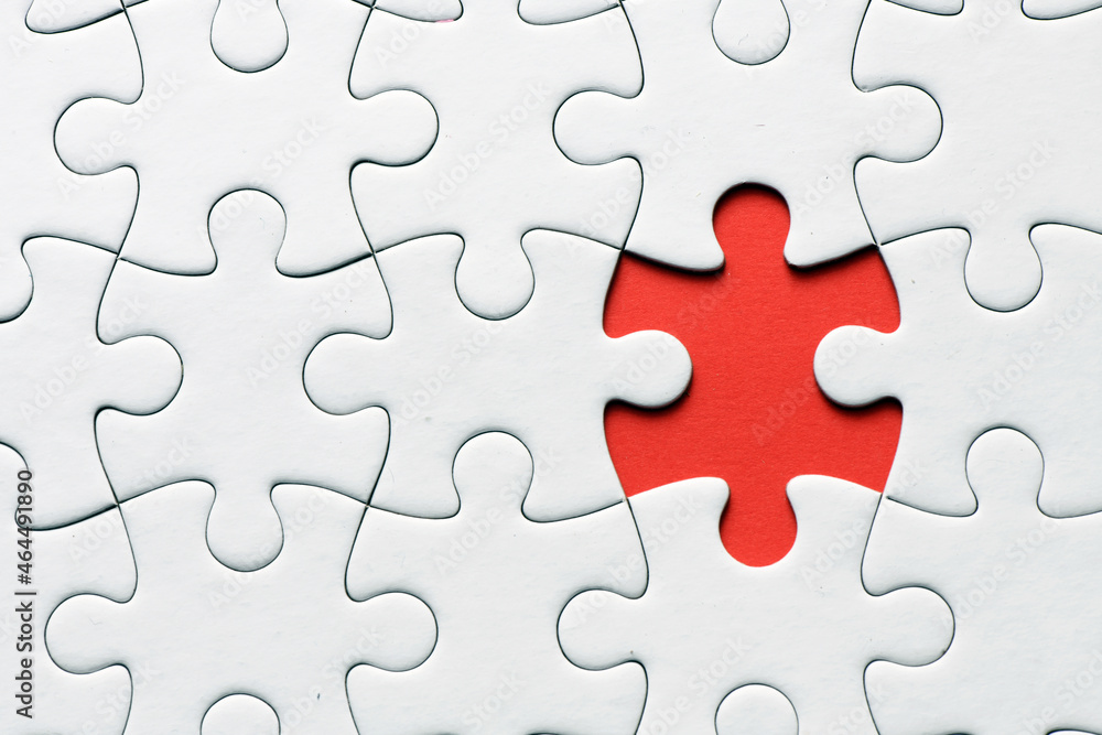 Red jigsaw puzzle pieces on red background. Copy space and business concept Red jigsaw puzzle pieces on red background. Copy space and business concept