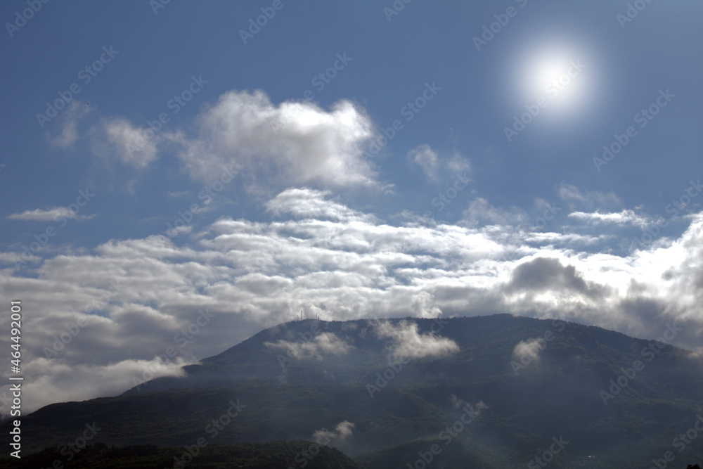 clouds in the mountains,sun,white,nature,travel,sky,blue,atmosphere, high, space, weather,light, air, day, white,
