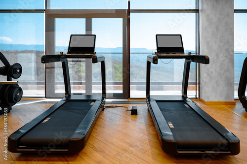Canvas-taulu Studio shot of a professional treadmill in modern gym