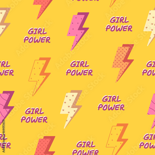 Girl power movement seamless pattern. girl power lightning.Grl pwr slogan. Female, feminism symbols. Feminism themed background. Bright sogan print for cover,wrapping paper,fabric,textile,cases.yellow photo