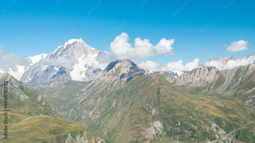 The summit of the majestic Monte Bianco (White Mountain) covered by a white cloud, Aosta Valley, Italy. It is the highes mountain in Italy and in Europe.