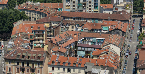 Cityscape of Torino with tile roof buildings, Italy