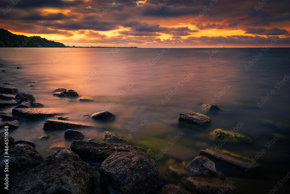 Sunrise over the beach on the Baltic Sea in Babie Doly, Gdynia, Poland