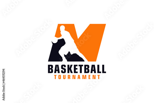 Letter M with Basketball Logo Design. Vector Design Template Elements for Sport Team or Corporate Identity.