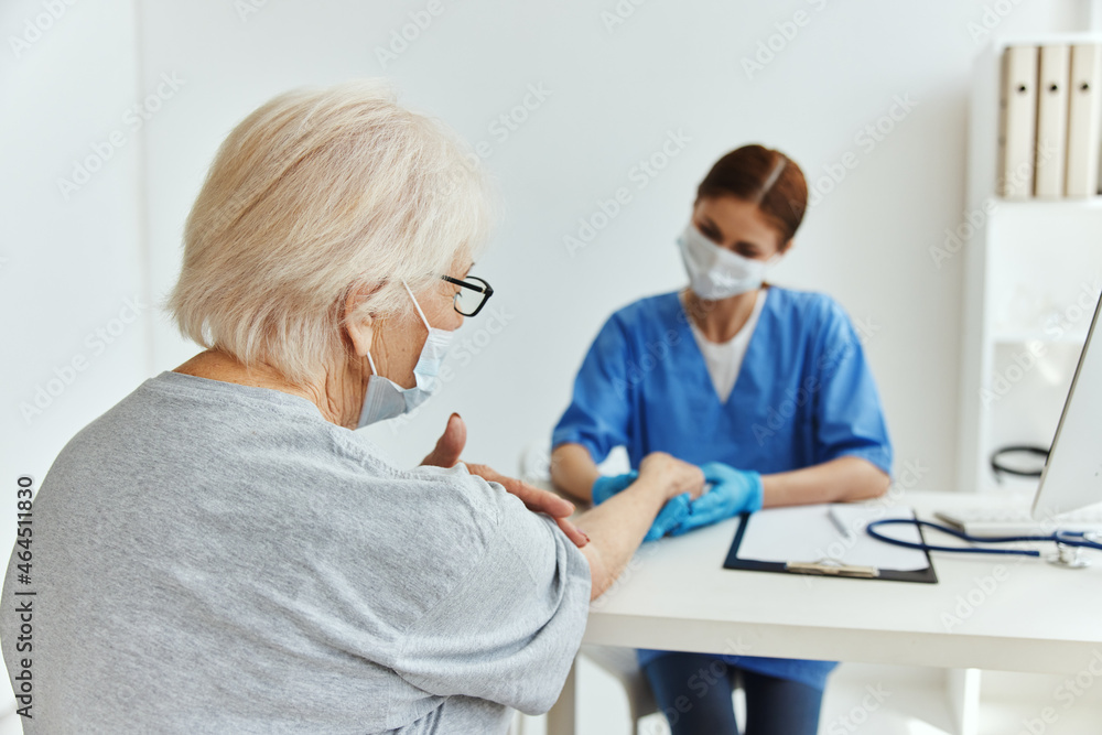nurse and patient professional examination medical office