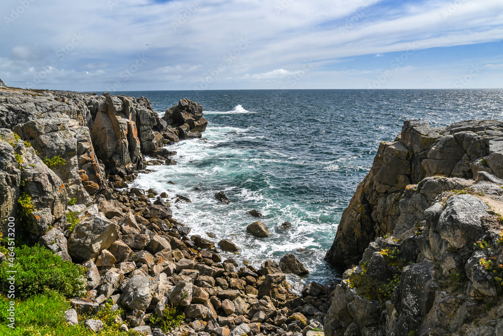 Rocky coast at the Atlantic Ocean in France landscape. Selective focus.