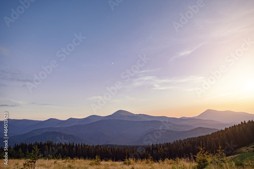 sunset over mountain peaks. mountains and evening sky