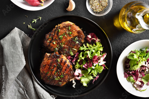 Roasted pork steak with vegetable salad