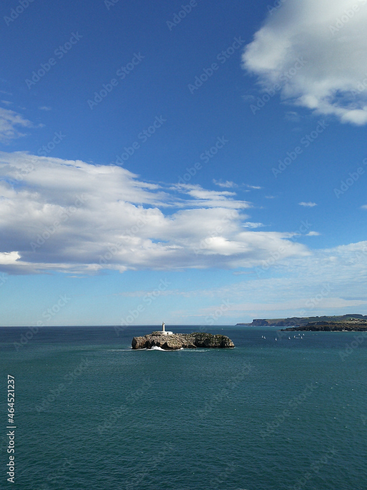 Mouro Island with sailboats. Santander Bay, Cantabria, Spain.