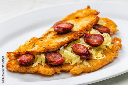 potato pancake filled with cabbage and sausage