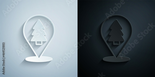 Paper cut Christmas tree icon isolated on grey and black background. Merry Christmas and Happy New Year. Paper art style. Vector