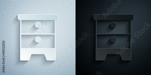 Paper cut Furniture nightstand icon isolated on grey and black background. Paper art style. Vector