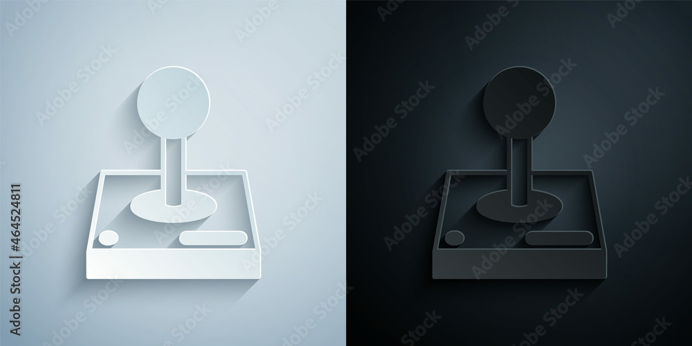 Paper cut Joystick for arcade machine icon isolated on grey and black background. Joystick gamepad. Paper art style. Vector Paper cut Joystick for arcade machine icon isolated on grey and black background. Joystick gamepad. Paper art style. Vector