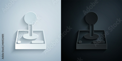 Paper cut Joystick for arcade machine icon isolated on grey and black background. Joystick gamepad. Paper art style. Vector