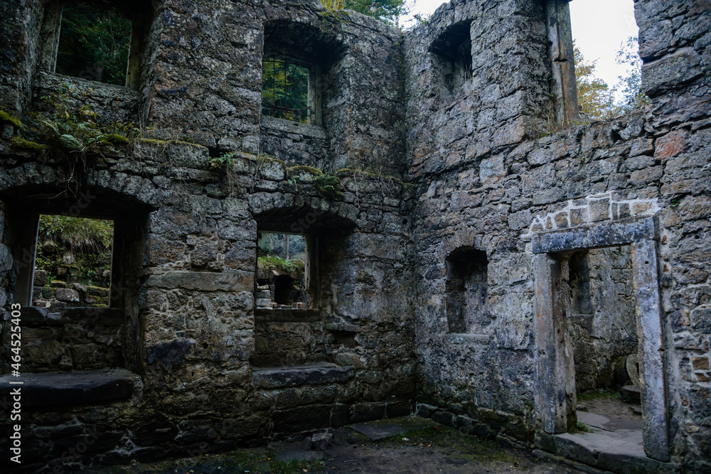 Bohemian Switzerland National Park, Czech Republic, 2 October 2021:  Ruins of Dolsky mlyn at River Kamenice, old stone water mill at Ceske Svycarsko, autumn sunny day, abandoned building, old masonry