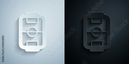 Paper cut Table football game hobby or leisure icon isolated on grey and black background. Sport team football players. Paper art style. Vector