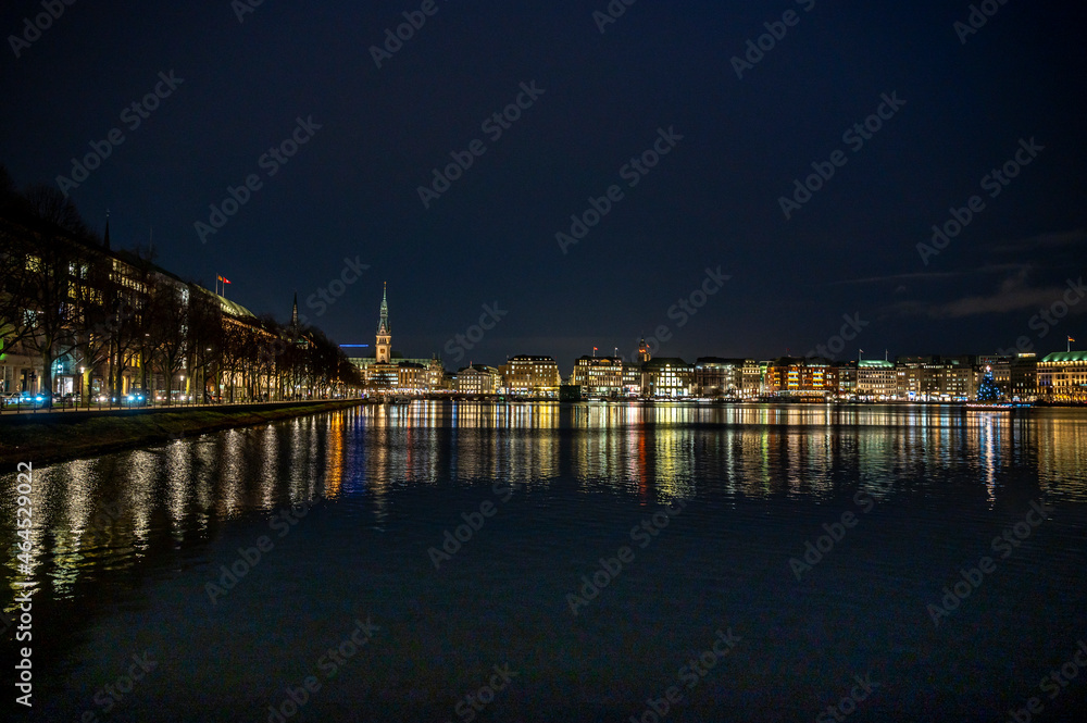 Hamburg city with the Alster at the late blue hour at christmas time