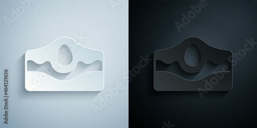 Paper cut Acne icon isolated on grey and black background. Inflamed pimple on the skin. The sebum in the clogged pore promotes the growth of a bacteria. Paper art style. Vector