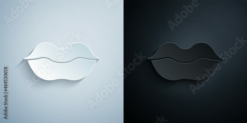 Paper cut Smiling lips icon isolated on grey and black background. Smile symbol. Paper art style. Vector