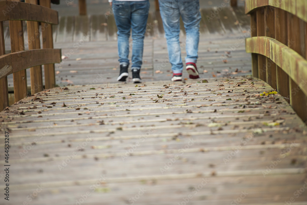 Couple dressed casually, hugs, caresses, walk, love, affection