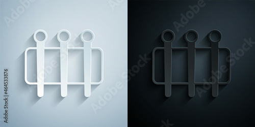 Paper cut Needle for sewing icon isolated on grey and black background. Tailor symbol. Textile sew up craft sign. Embroidery tool. Paper art style. Vector