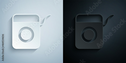 Paper cut Dental floss icon isolated on grey and black background. Paper art style. Vector