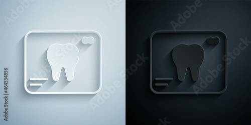 Paper cut X-ray of tooth icon isolated on grey and black background. Dental x-ray. Radiology image. Paper art style. Vector