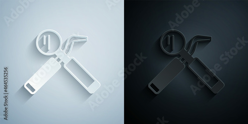 Paper cut Dental inspection mirror and probe icon isolated on grey and black background. Explorer scaler. Tool dental checkup. Paper art style. Vector