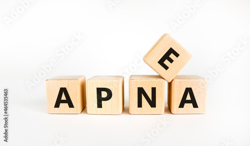 Apnea symbol. The concept word 'apnea' on wooden cubes on beautiful white table, white background, copy space. Medical and apnea concept.