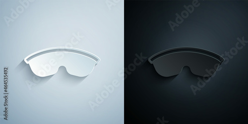 Paper cut Safety goggle glasses icon isolated on grey and black background. Paper art style. Vector