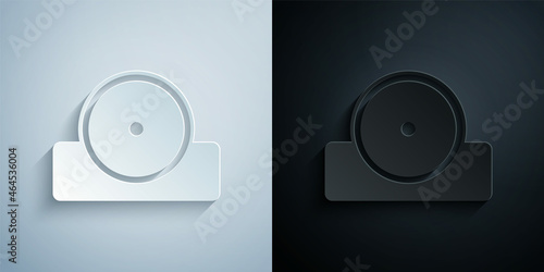Paper cut Otolaryngological head reflector icon isolated on grey and black background. Equipment for inspection the patients ear, throat and nose. Paper art style. Vector