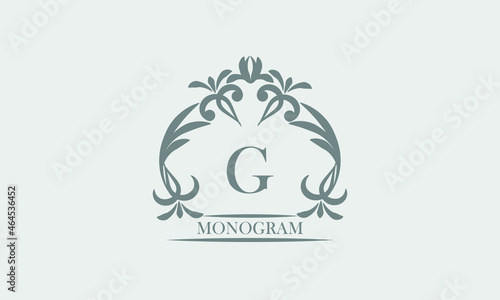 Graceful monogram in gray tones with the inscription and the letter G. Exquisite sign  logo of a restaurant  boutique  hotel  business