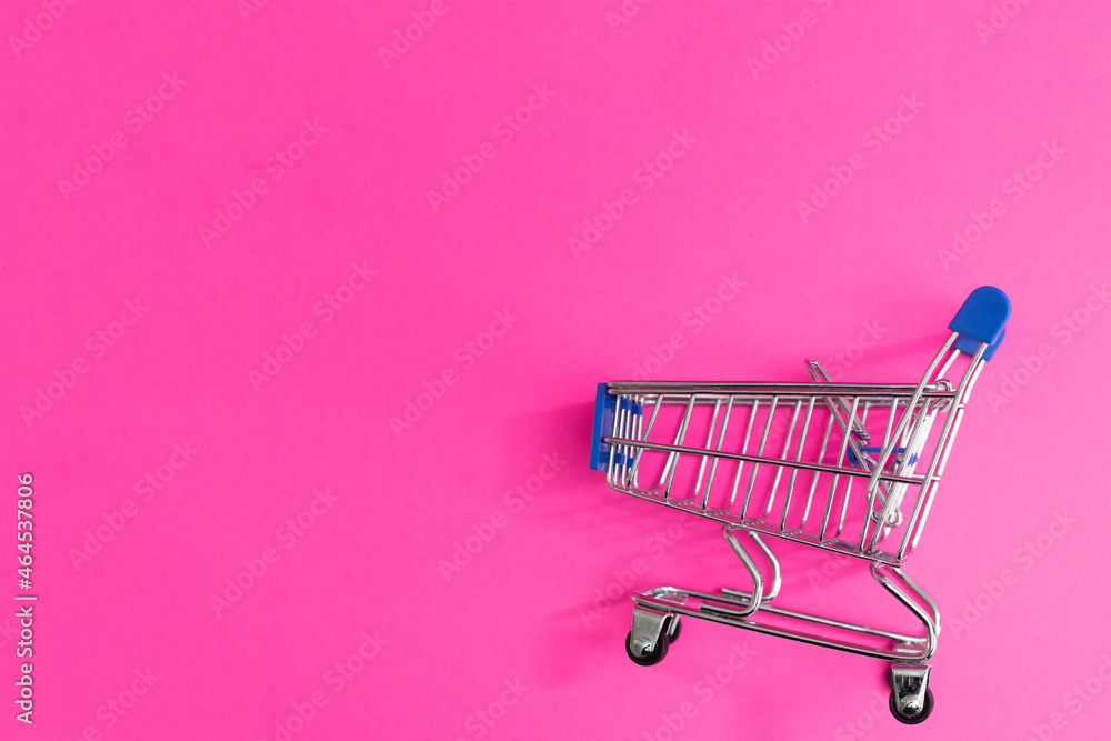 A Shopping Cart Isolated On pink background A Shopping Cart Isolated On pink background