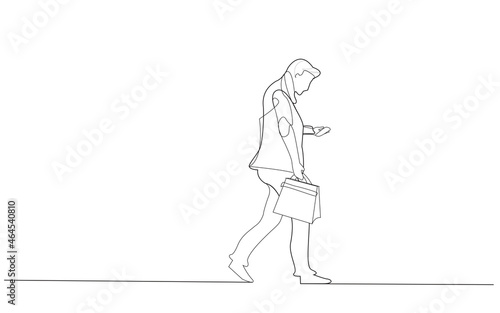 Fototapeta Naklejka Na Ścianę i Meble -  Businessman walking and typing sms message on cell phone. Man walking for marketing, poster, travel agency and magazine. Creative business concept, vector illustration